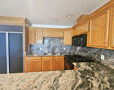 22040 Wyandotte Street - Photo Thumbnail 3