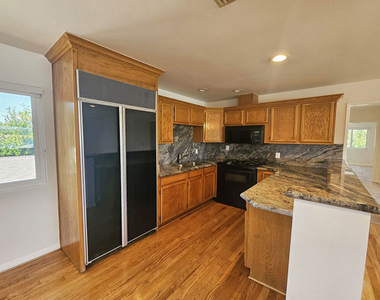 22040 Wyandotte Street - Photo Thumbnail 2