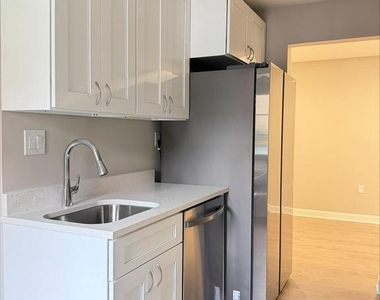 5931 Quantrell Avenue - Photo Thumbnail 7