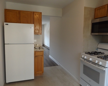 710 W Huntington Commons Road - Photo Thumbnail 8
