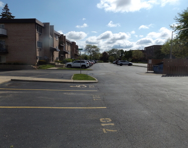 710 W Huntington Commons Road - Photo Thumbnail 2