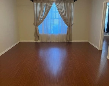 5542 Metrowest Boulevard - Photo Thumbnail 3
