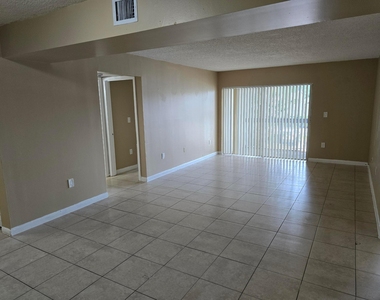711 N Pine Island Road - Photo Thumbnail 6