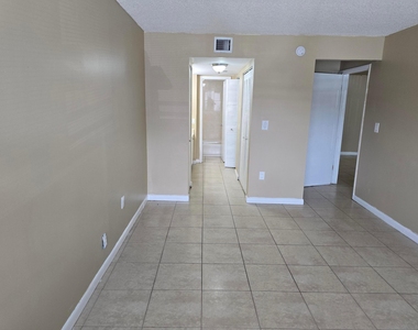 711 N Pine Island Road - Photo Thumbnail 12