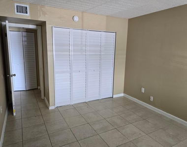 711 N Pine Island Road - Photo Thumbnail 10