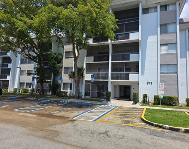 711 N Pine Island Road - Photo Thumbnail 1