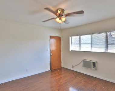 124 S Olive Avenue - Photo Thumbnail 2