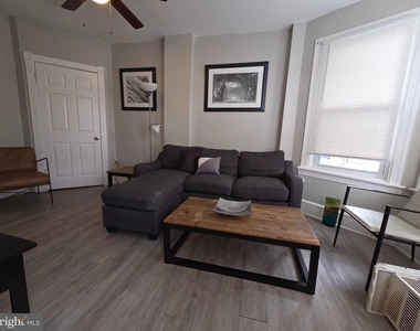 306 W 23rd Street - Photo Thumbnail 2