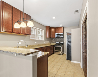 323 Memorial Drive - Photo Thumbnail 2