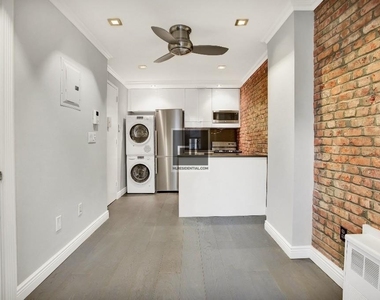 E 5th St. - Photo Thumbnail 2