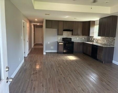 107 E Miller - Photo Thumbnail 3