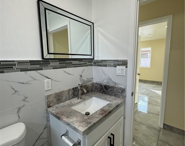 3538 1/4 W 108th Street - Photo Thumbnail 2
