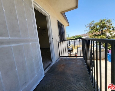 1426 1/2 E 48th Street - Photo Thumbnail 1