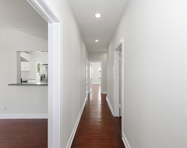 1150 S Tremaine Avenue - Photo Thumbnail 9