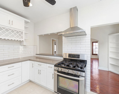 1150 S Tremaine Avenue - Photo Thumbnail 5