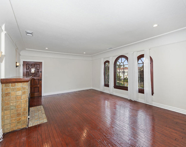 1150 S Tremaine Avenue - Photo Thumbnail 3