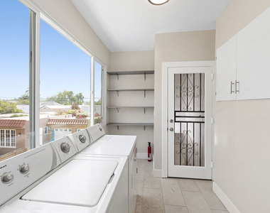 1150 S Tremaine Avenue - Photo Thumbnail 7