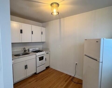 104 S Ferry Street - Photo Thumbnail 1