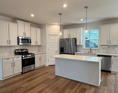 6414 Cowman Way - Photo Thumbnail 1