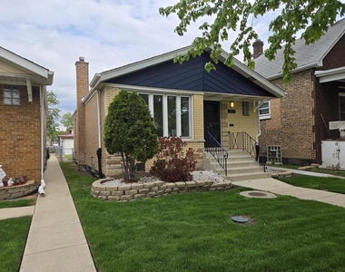 5822 W 64th Place - Photo Thumbnail 2