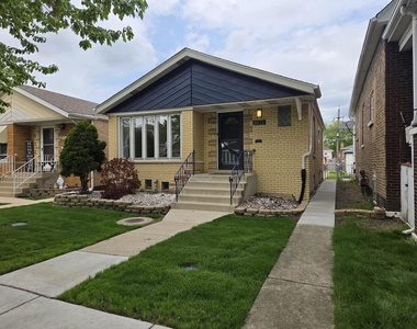 5822 W 64th Place - Photo Thumbnail 1