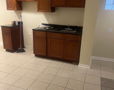 8235 S Vernon Avenue - Photo Thumbnail 6