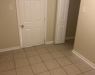 8235 S Vernon Avenue - Photo Thumbnail 8