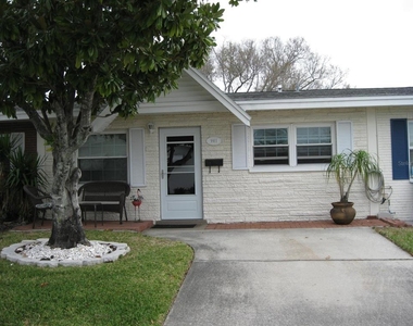 9911 Dahlia Street N - Photo Thumbnail 1
