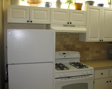 9911 Dahlia Street N - Photo Thumbnail 18