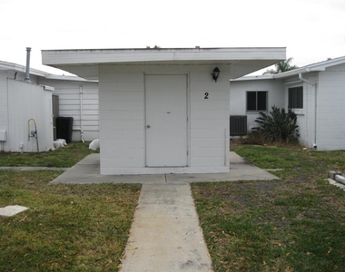 9911 Dahlia Street N - Photo Thumbnail 26