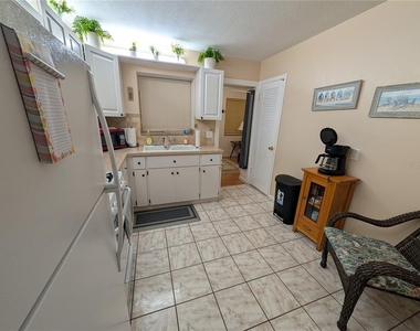 9911 Dahlia Street N - Photo Thumbnail 19