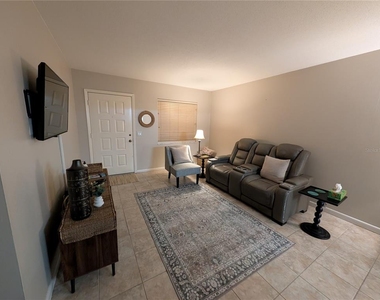 9911 Dahlia Street N - Photo Thumbnail 4