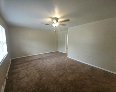 6419 Onyx Drive N - Photo Thumbnail 2