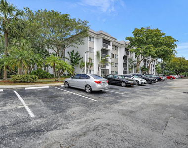 711 N Pine Island Road - Photo Thumbnail 1
