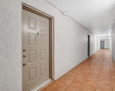 711 N Pine Island Road - Photo Thumbnail 2
