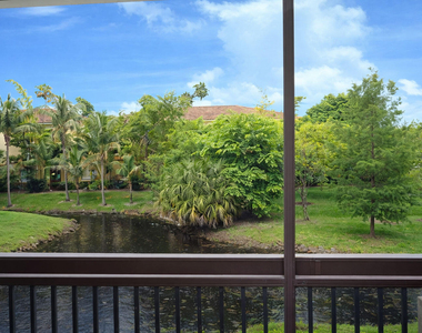 711 N Pine Island Road - Photo Thumbnail 4
