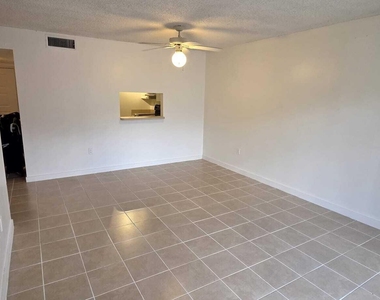 711 N Pine Island Road - Photo Thumbnail 6