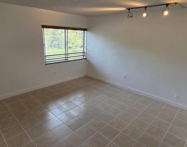 711 N Pine Island Road - Photo Thumbnail 11