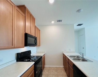 6409 Wagon Spring St - Photo Thumbnail 2