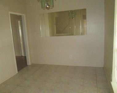 811 Whispering Pine Drive - Photo Thumbnail 4
