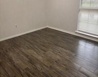 7916 Rice Drive - Photo Thumbnail 2