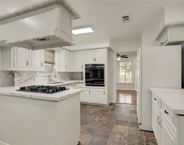 5735 Wigton Drive - Photo Thumbnail 3