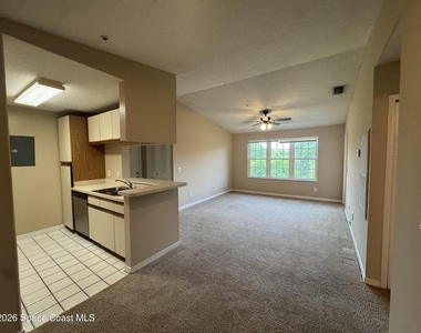 7667 N Wickham Road - Photo Thumbnail 4