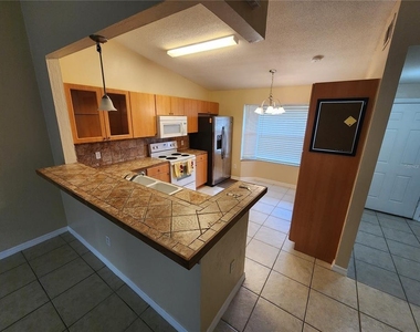 5820 Alstrum Drive - Photo Thumbnail 4
