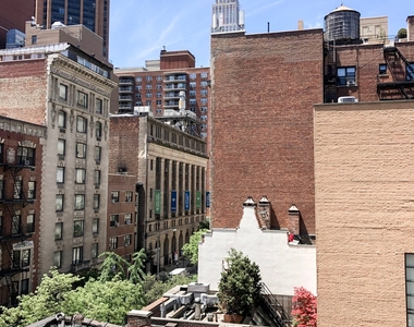 East 35 Street - Photo Thumbnail 6