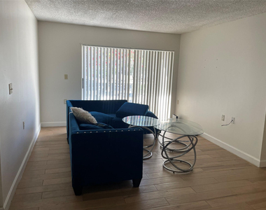 1068 N Benoist Farms Road - Photo Thumbnail 3