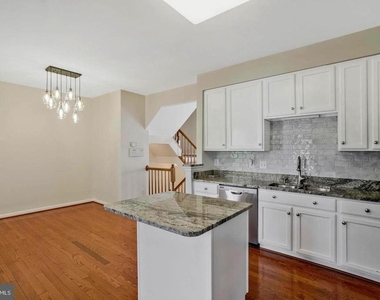 8034 Horseshoe Cottage Circle - Photo Thumbnail 1
