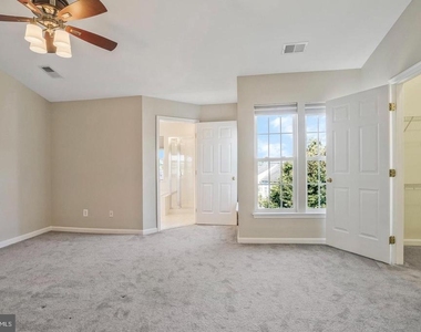 8034 Horseshoe Cottage Circle - Photo Thumbnail 18