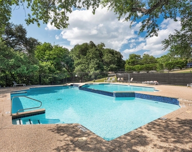 1015 E Yager Ln - Photo Thumbnail 2