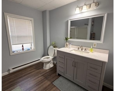 102 W State Street - Photo Thumbnail 1